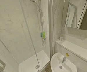 Shower, towels, soap, shampoo