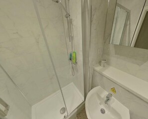 Shower, towels, soap, shampoo