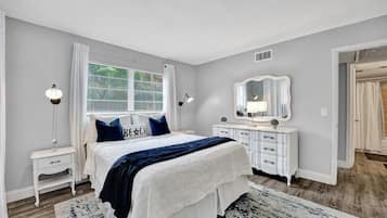 1 bedroom, desk, iron/ironing board, travel crib