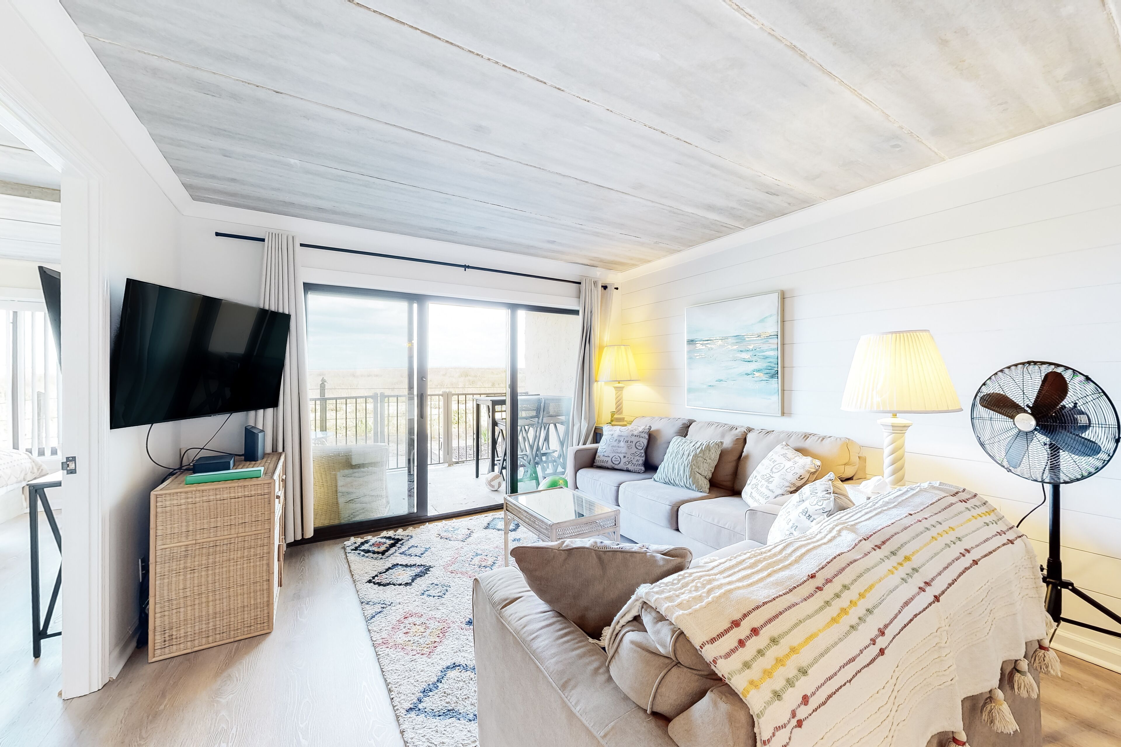 Beautifully renovated oceanfront condo with patio, AC, elevator, & WiFi