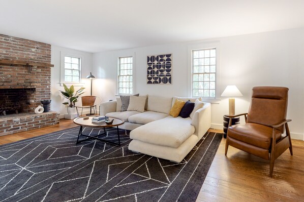 TV, fireplace, books, stereo