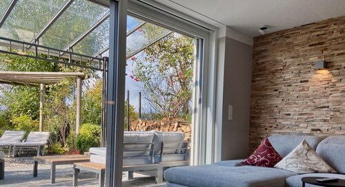 Ferienwohnung Garten-Oase - Hochwertige Gartenwohnung mit Sonnenterrasse