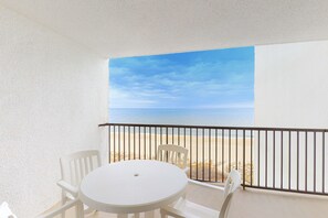 Outdoor dining - Oceanfront Condo with Beach Views, Balcony, AC, WiFi & Shared Outdoor Pool (Ocean City)