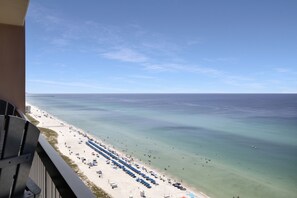On the beach, sun-loungers