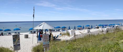 On the beach, sun-loungers