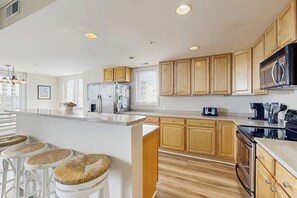 Fridge, microwave, oven, stovetop - Terrific Beach Condo w/Spacious Balcony, W/D, Shared Pool, Fitness Center, WiFi (Ocean City)