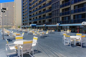 Outdoor dining - Affordable beachfront condo with balcony, W/D & pools (Ocean City)