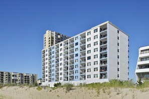 Residents enjoy balconies with ocean views from this coastal high-rise.