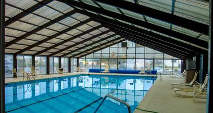 Cozy suite in oceanfront condo with indoor pool, balcony, gym, & central AC