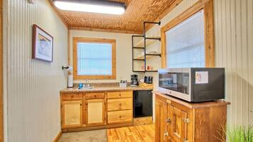 Fridge, microwave, coffee/tea maker, toaster