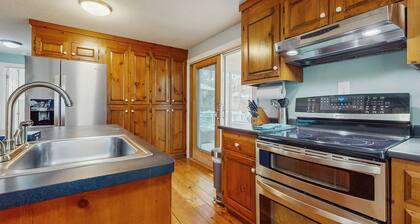 Cheery house with deck, sunroom & patio - short walk to pond, beach & Rail Trail