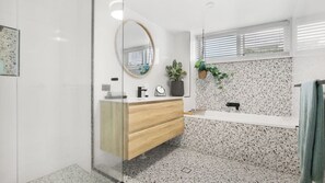 Bathtub, hair dryer, towels