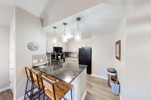 Fridge, microwave, oven, stovetop - Luxe Mountain-View Ski Getaway | Next to Tranquil River | Pool, Hot Tub (Edwards)
