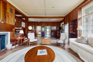 TV, fireplace, books