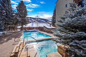 Outdoor pool, a heated pool - Luxury, Remodeled Retreat w/ Ski Slope Views Throughout! Walk to Gondola & Shops (Vail)