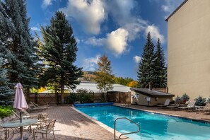 Outdoor pool, a heated pool - Luxury, Remodeled Retreat w/ Ski Slope Views Throughout! Walk to Gondola & Shops (Vail)