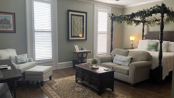 Habitación individual Deluxe | Ropa de cama de alta calidad y decoración personalizada