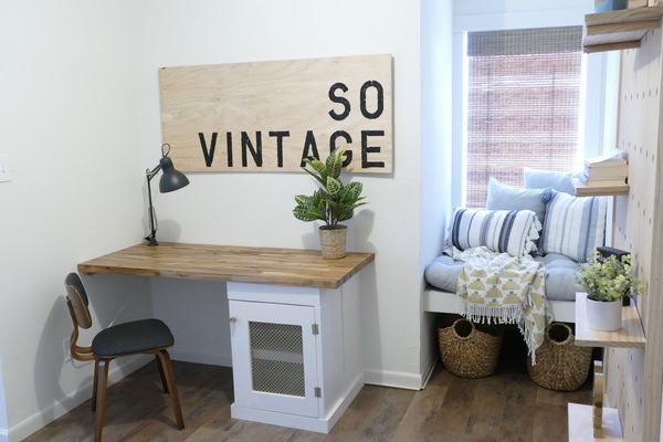 At the top of the stairs you'll find a work area and a cozy seating place.