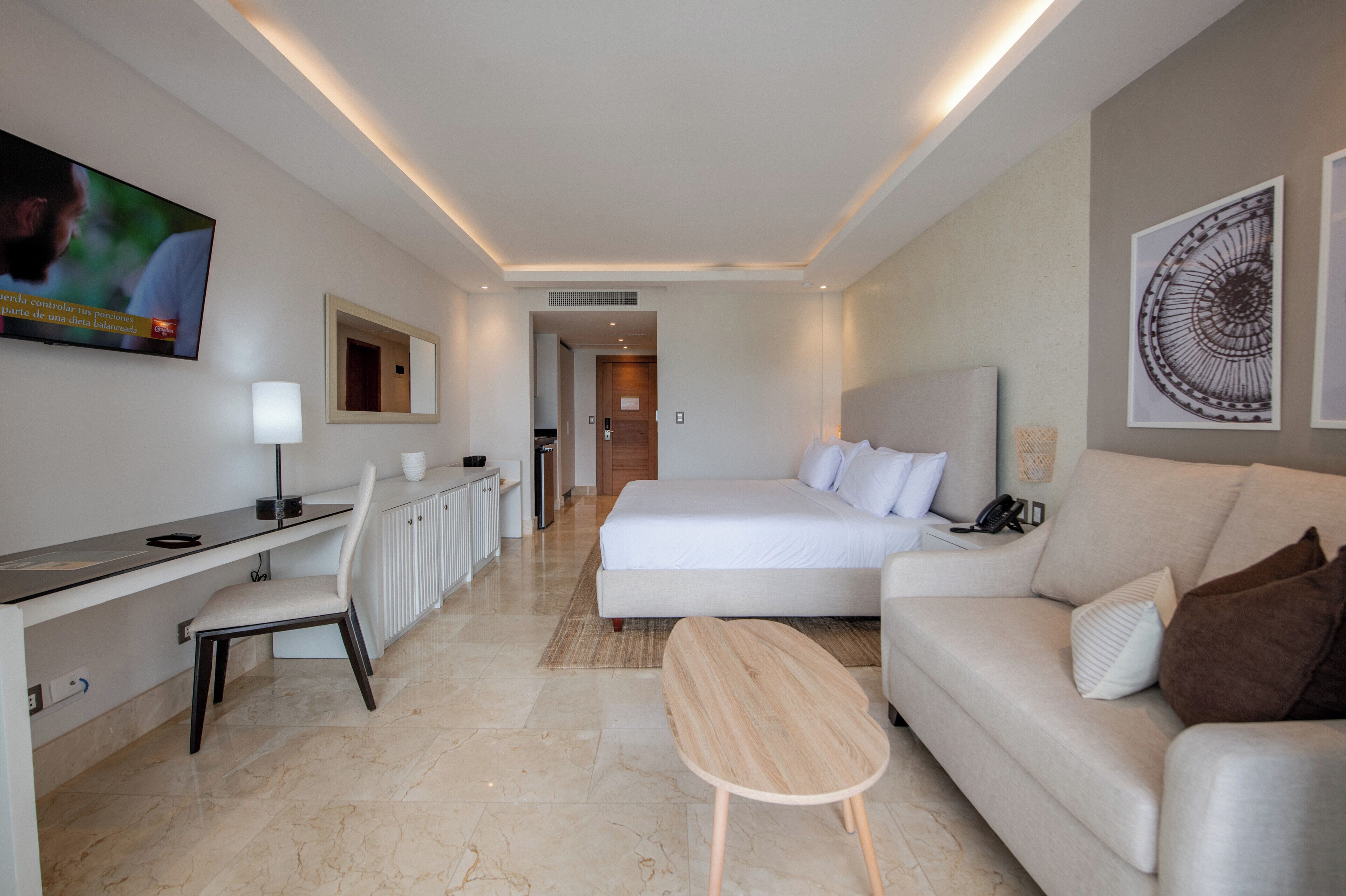 junior studio suite, non smoking, ocean view | 1 bedroom, minibar, in-room safe, desk