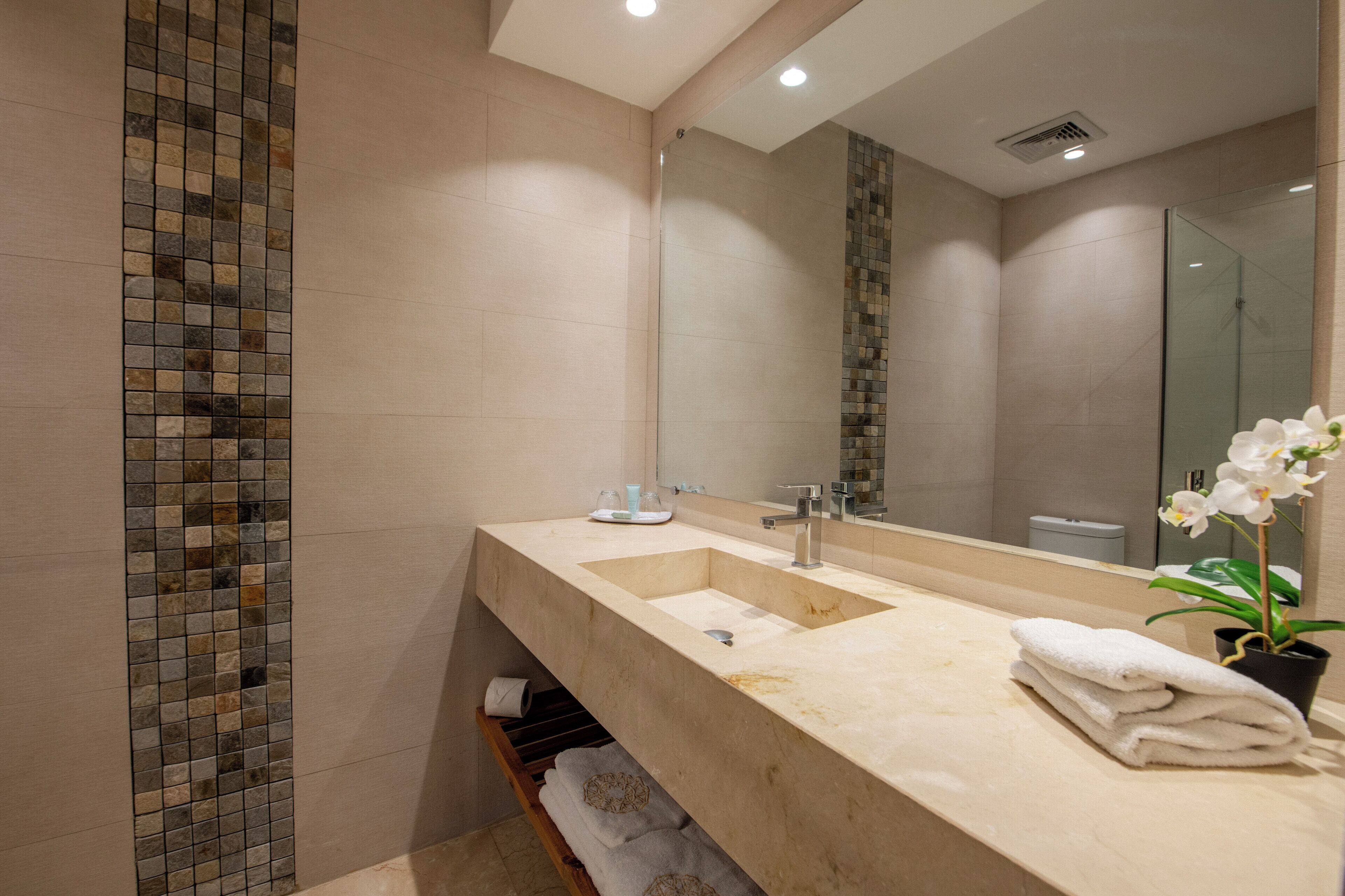 family suite, non smoking, ocean view | bathroom | shower, rainfall showerhead, bathrobes, slippers