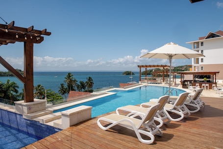 3 outdoor pools, open 8:00 AM to 7:00 PM, pool umbrellas, sun loungers