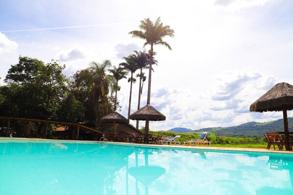 Outdoor pool, open 7:00 AM to 6:30 PM, pool loungers