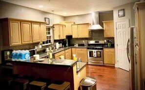 Fridge, oven, dishwasher, cookware/dishes/utensils