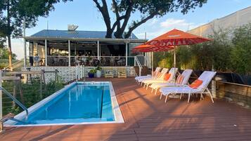 Outdoor pool, open 8:00 AM to midnight, free cabanas, pool umbrellas