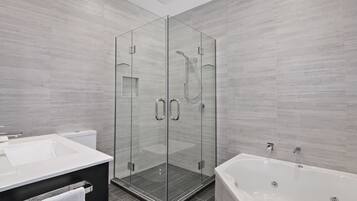 Family Suite, 3 Bedrooms | Bathroom | Rainfall showerhead, free toiletries, hair dryer, towels