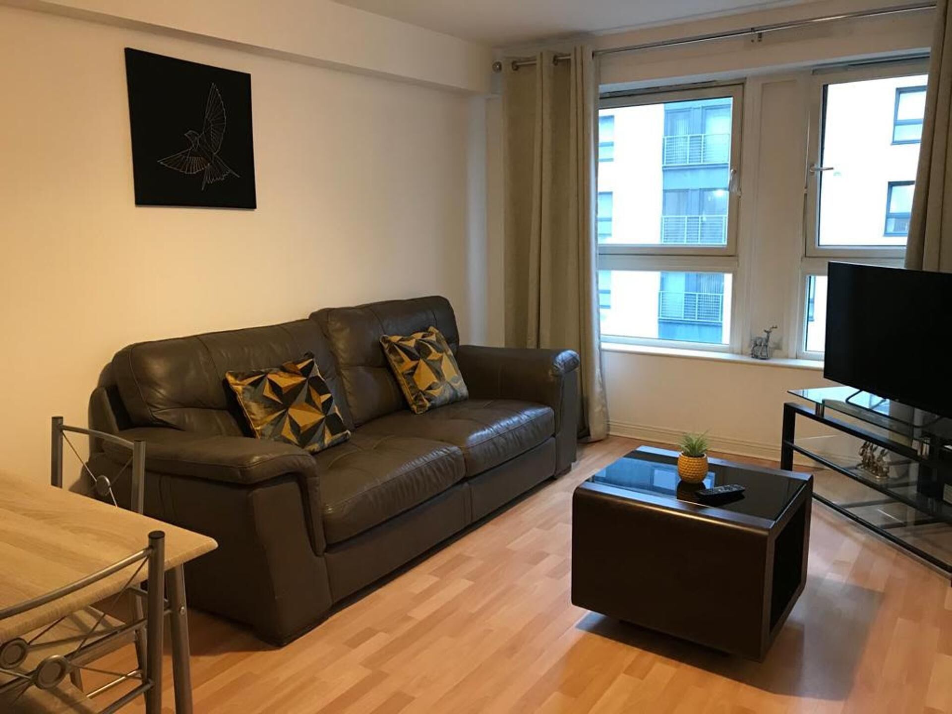 Apartment | Living room | 30-inch TV with cable channels