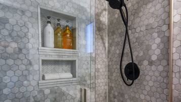 Combined shower/bathtub, hair dryer, towels, soap