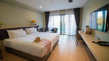 Premium bedding, memory foam beds, minibar, in-room safe