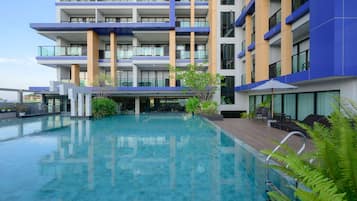 Outdoor pool, open 7:00 AM to 9:00 PM, pool umbrellas, sun loungers