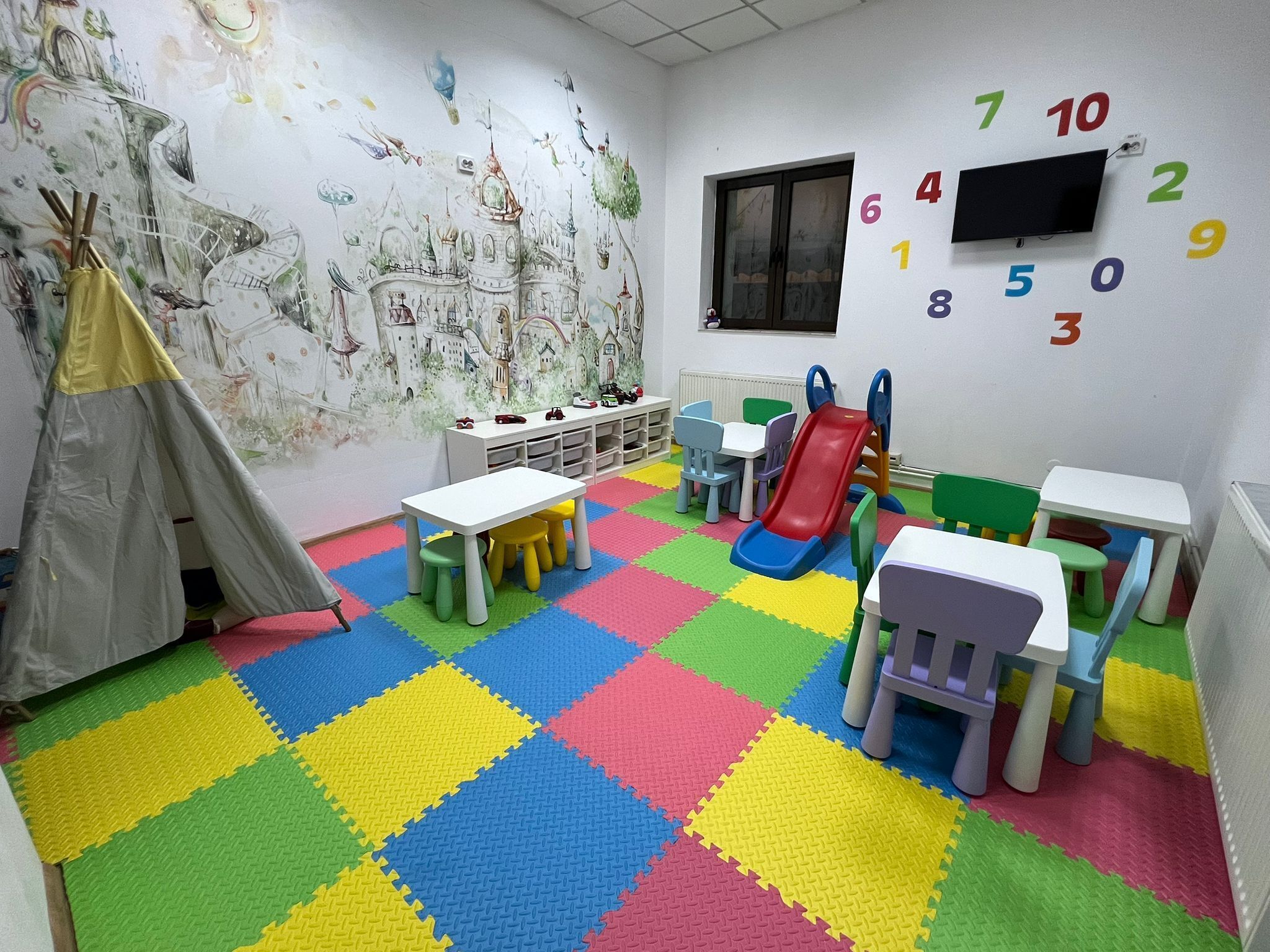 Área de juegos infantiles techada