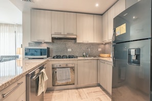 Fridge, dishwasher, coffee/tea maker, cookware/dishes/utensils - Exclusive 1BR apt nearby beach at el Portillo: VC (Las Terrenas)