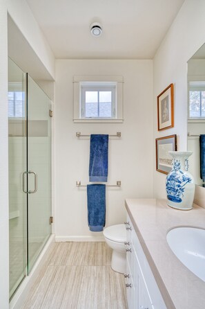 Shower, hair dryer, towels, soap