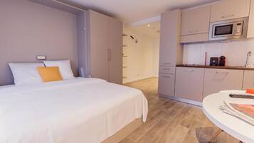 Apartment, 1 Queen Bed | 1 bedroom, iron/ironing board, free WiFi, bed sheets
