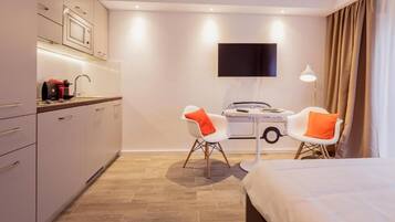 Apartment, 1 Queen Bed | 1 bedroom, iron/ironing board, free WiFi, bed sheets