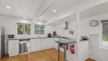 Microwave, dishwasher, cookware/dishes/utensils, paper towels