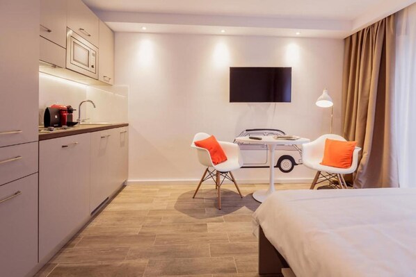 Departamento, 1 cama Queen size | 1 habitación, tabla de planchar con plancha, wifi gratis y ropa de cama 