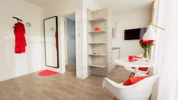 Departamento, 1 cama Queen size | 1 habitación, tabla de planchar con plancha, wifi gratis y ropa de cama