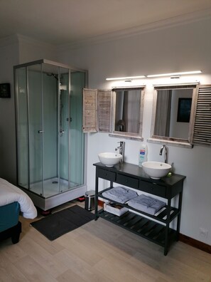 Bathtub, hair dryer, towels, soap