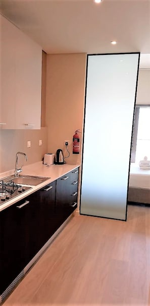 Apartment (0 Bedroom) | Private kitchenette | Oven, toaster, toaster oven, cookware/dishes/utensils - Park View Gorgeous Studio With Balcony (Dubai)