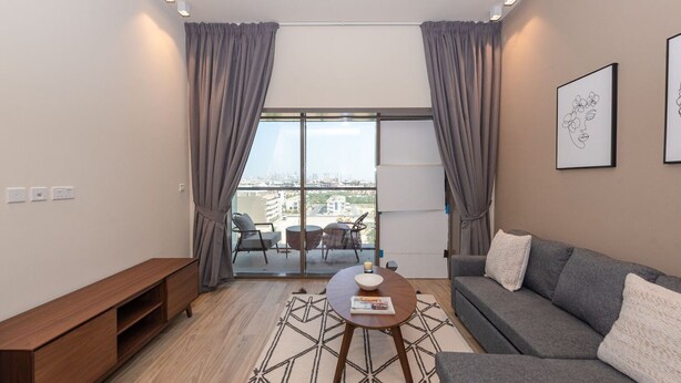Apartment (0 Bedroom) | Living area | 0-cm plasma TV with satellite channels, TV - Brand new Studio With Balcony at Park View (Dubai)
