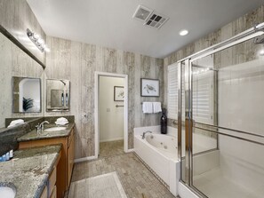 Combined shower/tub, jetted tub, hair dryer, towels