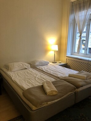 Apartment, 3 Einzelbetten | 1 Schlafzimmer, kostenloses WLAN, Bettwäsche
