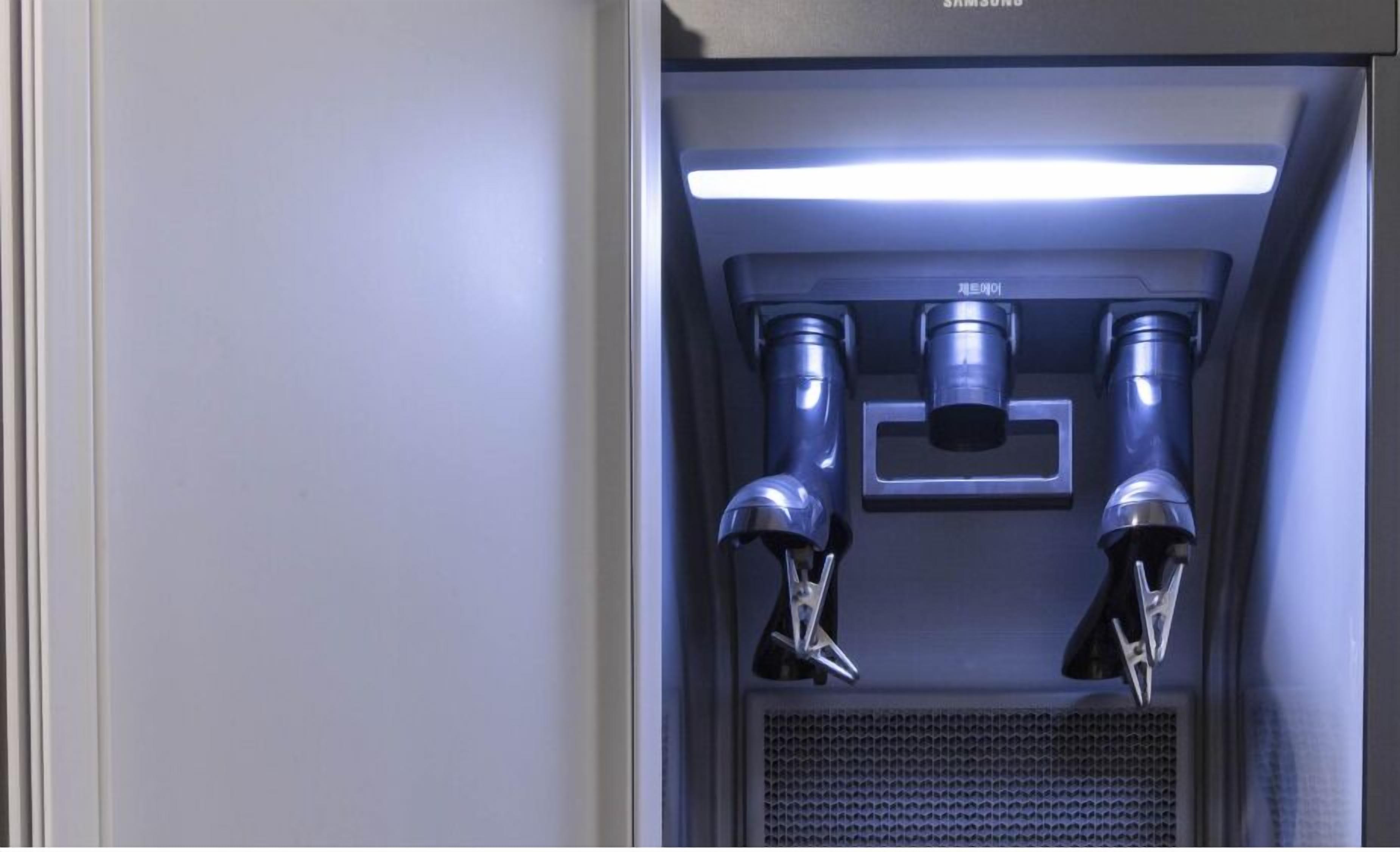 A Samsung refrigerator with a water dispenser and a built-in ice maker.