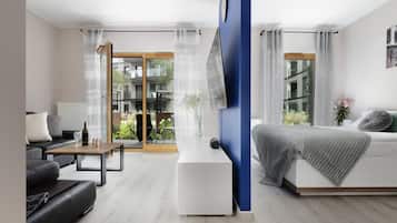 Premium-Apartment (Indygo) | Wohnbereich | Flachbildfernseher