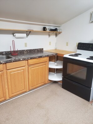 Fridge, microwave, stovetop, coffee/tea maker