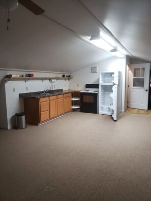 Fridge, microwave, stovetop, coffee/tea maker
